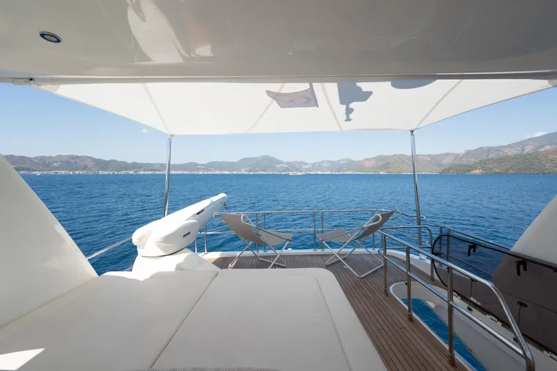 My Lady Yacht Photos Pics Luxurious 2014 Princess 72 Flybridge Motor Yacht with scenic ocean view and comfortable seating.