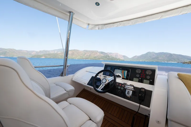 My Lady Yacht Photos Pics Flybridge helm of 2014 Princess 72 Motor Yacht with scenic ocean view.