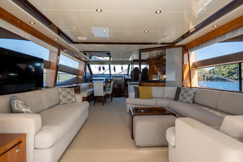 My Lady Yacht Photos Pics Luxurious interior of 2014 Princess 72 Flybridge Motor Yacht with elegant seating and large windows.