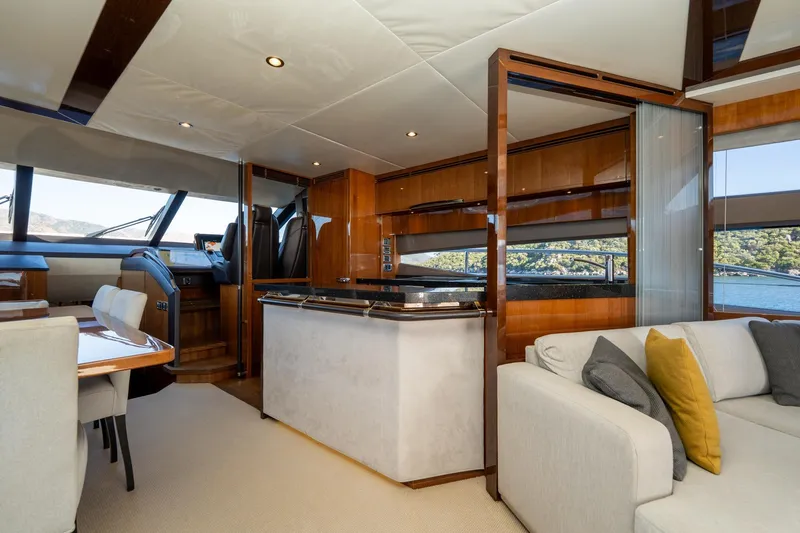 My Lady Yacht Photos Pics Luxurious interior of 2014 Princess 72 Flybridge Motor Yacht with elegant wood finishes.