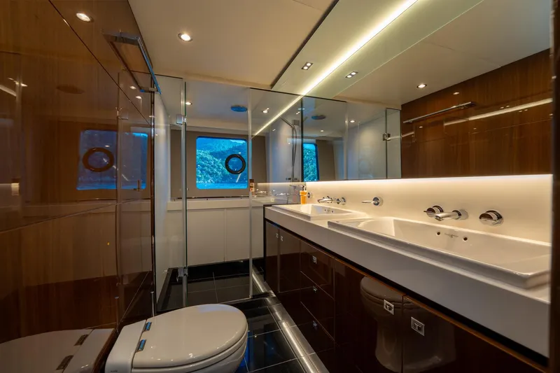 My Lady Yacht Photos Pics Luxurious bathroom in 2014 Princess 72 Flybridge Motor Yacht with dual sinks and modern fixtures.