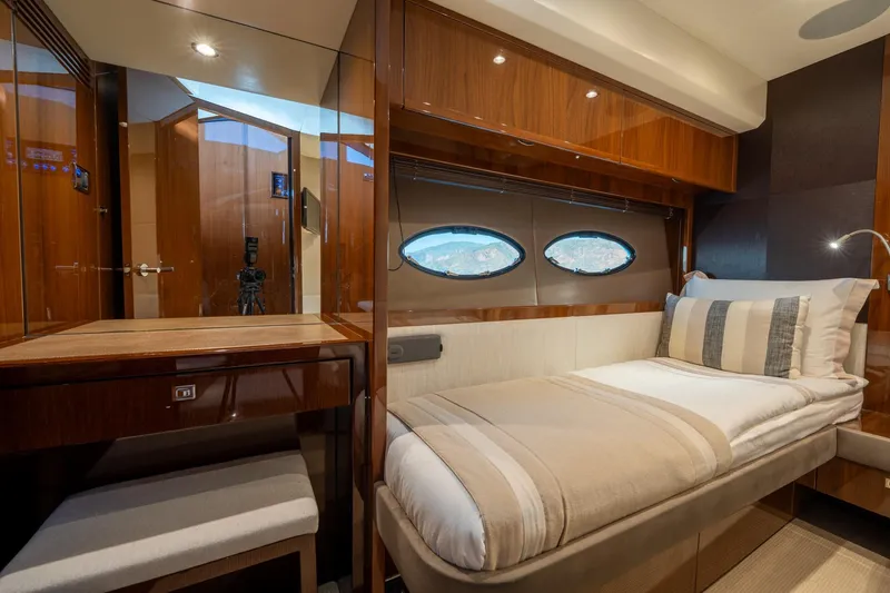 My Lady Yacht Photos Pics Luxurious cabin interior of 2014 Princess 72 Flybridge Motor Yacht with elegant wood finishes.