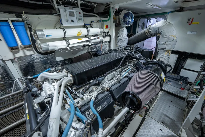 My Lady Yacht Photos Pics Engine room of 2014 Princess 72 Flybridge Motor Yacht, showcasing complex machinery and components.