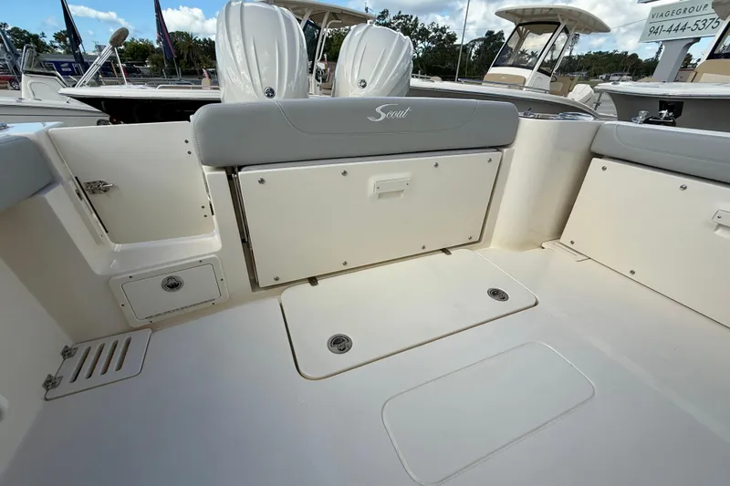  Yacht Photos Pics 2026 Scout 255 Dorado boat interior with seating and storage compartments.
