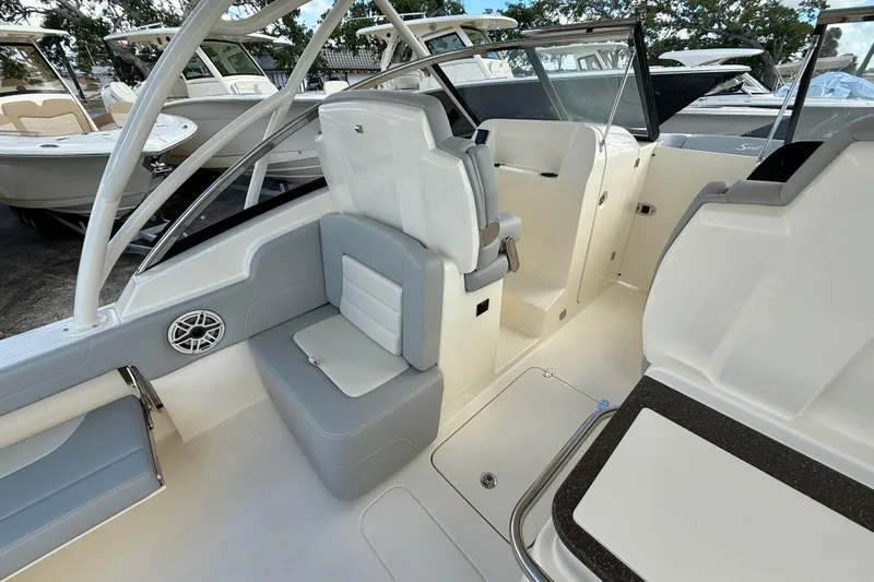  Yacht Photos Pics 2026 Scout 255 Dorado boat interior with seating and helm area.