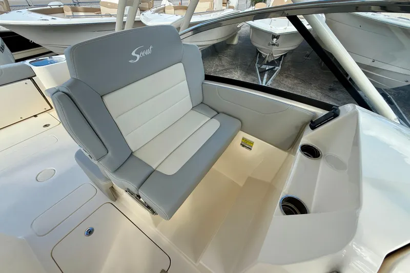  Yacht Photos Pics 2026 Scout 255 Dorado boat interior with comfortable seating and cup holders.