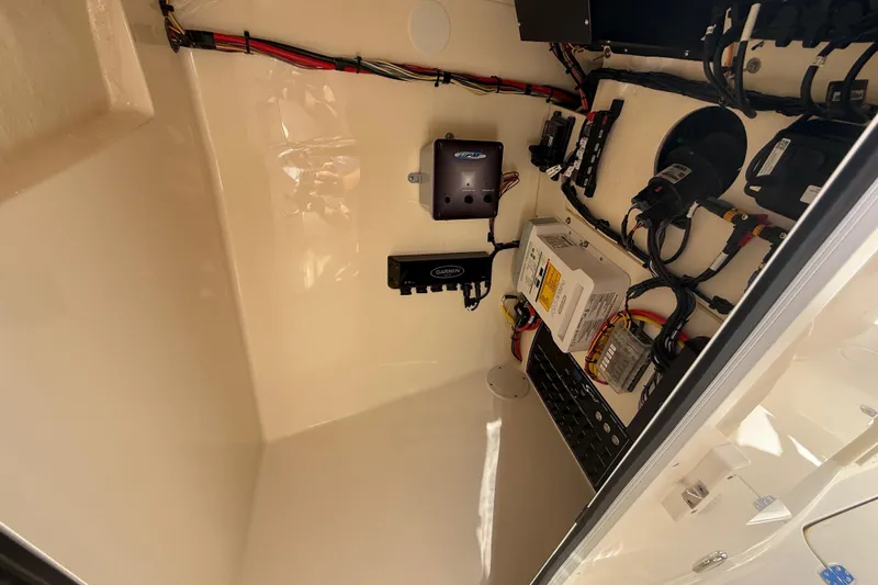  Yacht Photos Pics 2026 Scout 255 Dorado electrical compartment with wiring and components.