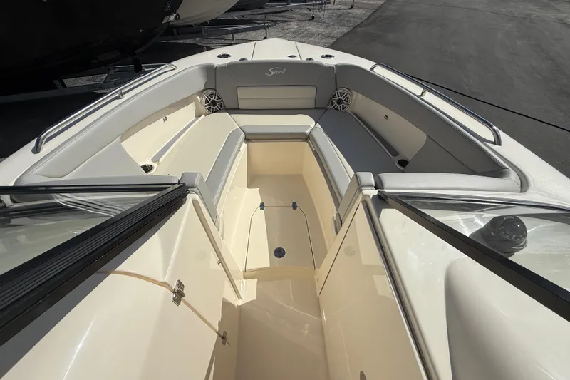  Yacht Photos Pics 2026 Scout 255 Dorado boat interior with spacious seating and sleek design.