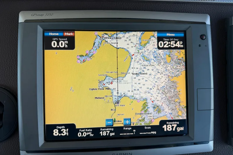  Yacht Photos Pics Garmin GPS display on 2015 Regal 46 Sport Coupe showing nautical map and navigation data.