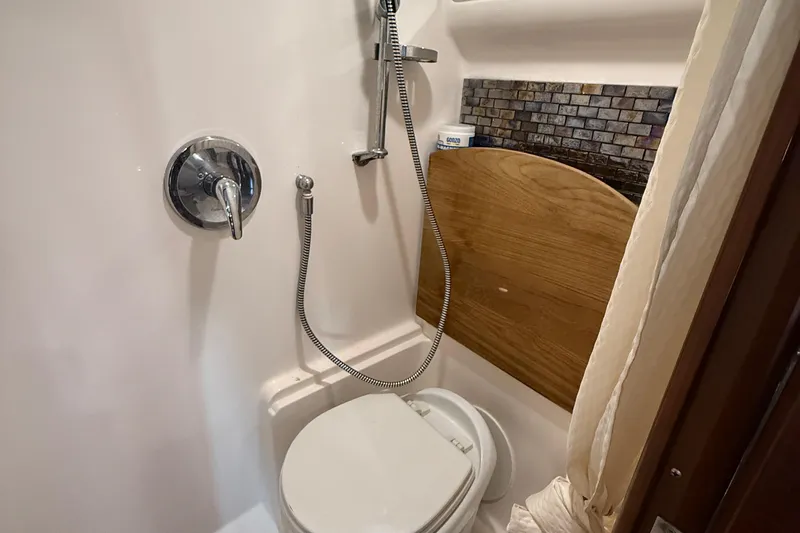  Yacht Photos Pics Bathroom in 2015 Regal 46 Sport Coupe yacht with shower and toilet.