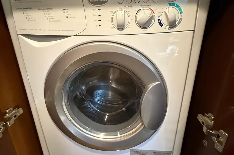  Yacht Photos Pics Front-loading washing machine inside a 2015 Regal 46 Sport Coupe yacht.