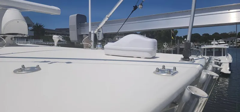  Yacht Photos Pics 2013 SeaVee 32 boat deck with mounted equipment, docked in a marina.