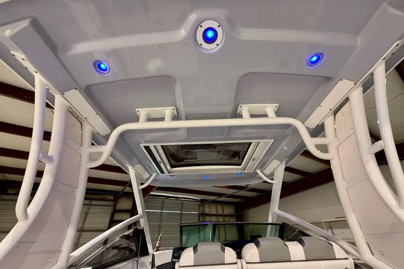  Yacht Photos Pics 2021 Chaparral 280 OSX boat interior with blue LED lights and modern design.