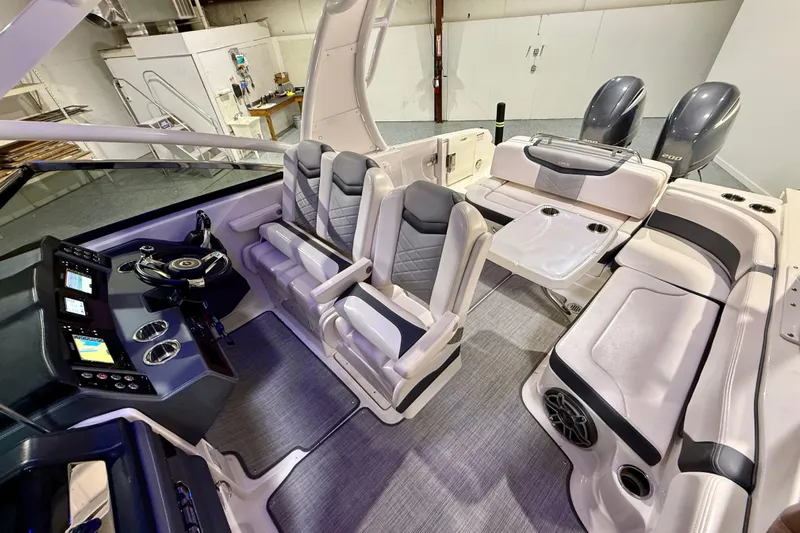  Yacht Photos Pics 2021 Chaparral 280 OSX boat interior with modern seating and dual engines.