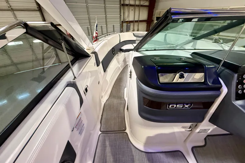  Yacht Photos Pics 2021 Chaparral 280 OSX boat interior with sleek design and modern dashboard.