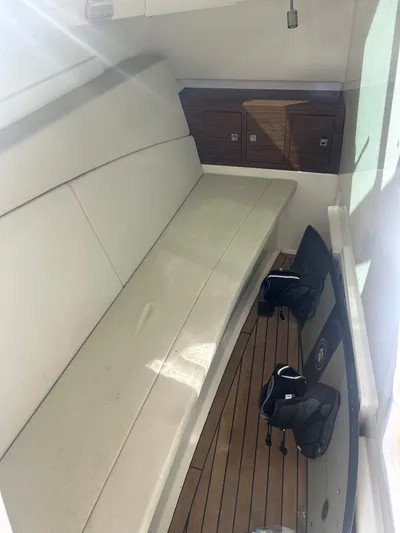 320 Vantage Yacht Photos Pics Interior of 2022 Boston Whaler 320 Vantage with seating and storage.