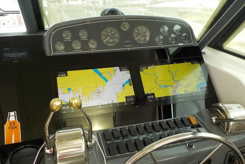 "sapphire" Yacht Photos Pics Cockpit of 2001 Tiara Yachts 3800 Open with navigation screens and controls.