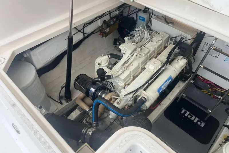 "sapphire" Yacht Photos Pics Engine compartment of a 2001 Tiara Yachts 3800 Open, showcasing detailed mechanical components.