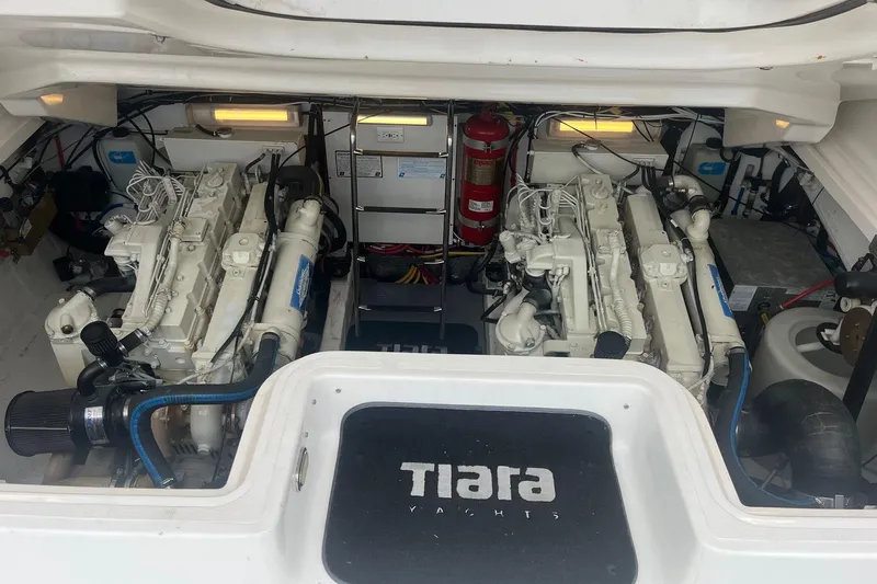 "sapphire" Yacht Photos Pics Engine compartment of a 2001 Tiara Yachts 3800 Open, showcasing dual engines and equipment.