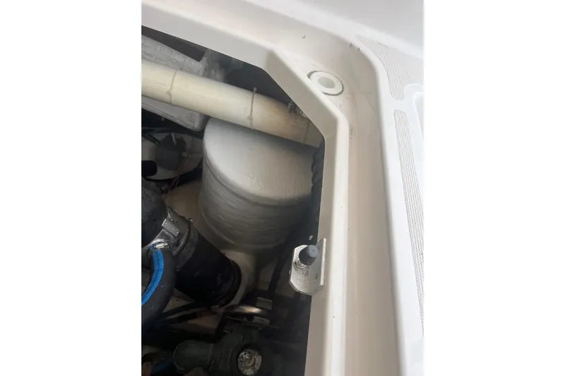 "sapphire" Yacht Photos Pics Engine compartment of a 2001 Tiara Yachts 3800 Open, showing pipes and components.