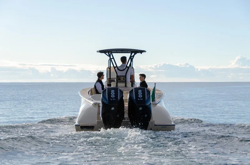  Yacht Photos Pics 2025 AlCustom Levanzo 25 boat with dual engines cruising on open water.