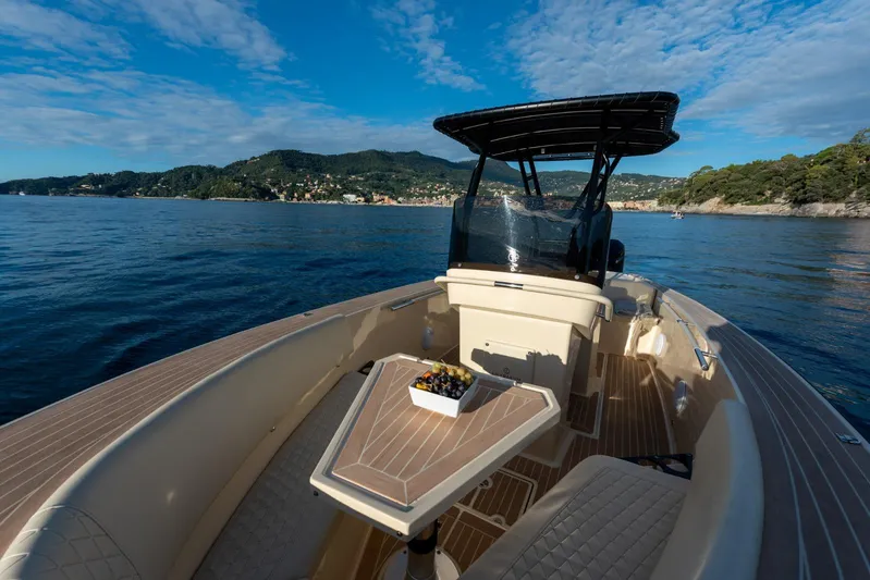  Yacht Photos Pics AlCustom Levanzo 25 boat, 2025 model, cruising on serene waters with scenic coastal backdrop.
