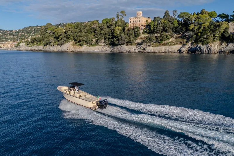  Yacht Photos Pics AlCustom Levanzo 25 boat cruising near scenic coastline, 2025 model.