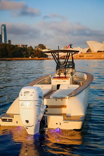  Yacht Photos Pics 2025 AlCustom Levanzo 25 boat on water, cityscape and iconic architecture in background.