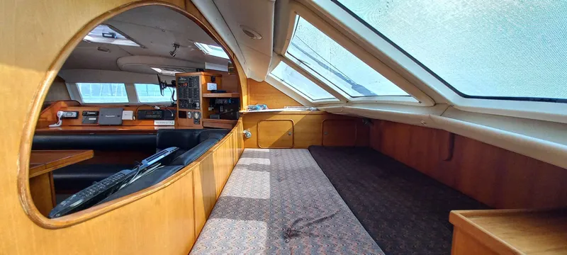 Zarafet Yacht Photos Pics Interior of a 1995 Prout 45 catamaran, featuring spacious cabin and navigation area.