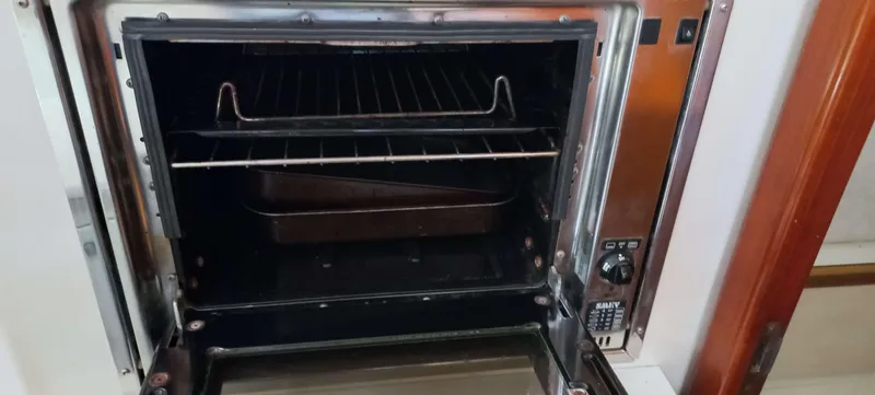 Zarafet Yacht Photos Pics Open oven with racks and tray inside, Prout 45 model, 1995.