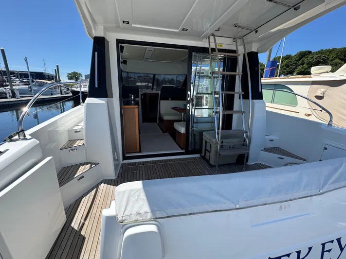 Portkey Yacht Photos Pics 2016 Jeanneau Velasco 37F yacht with open deck and interior view at marina.