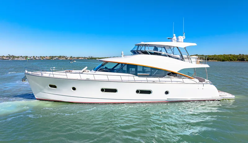 Dog House Yacht Photos Pics 2025 Belize 66 Daybridge yacht cruising on a sunny day.