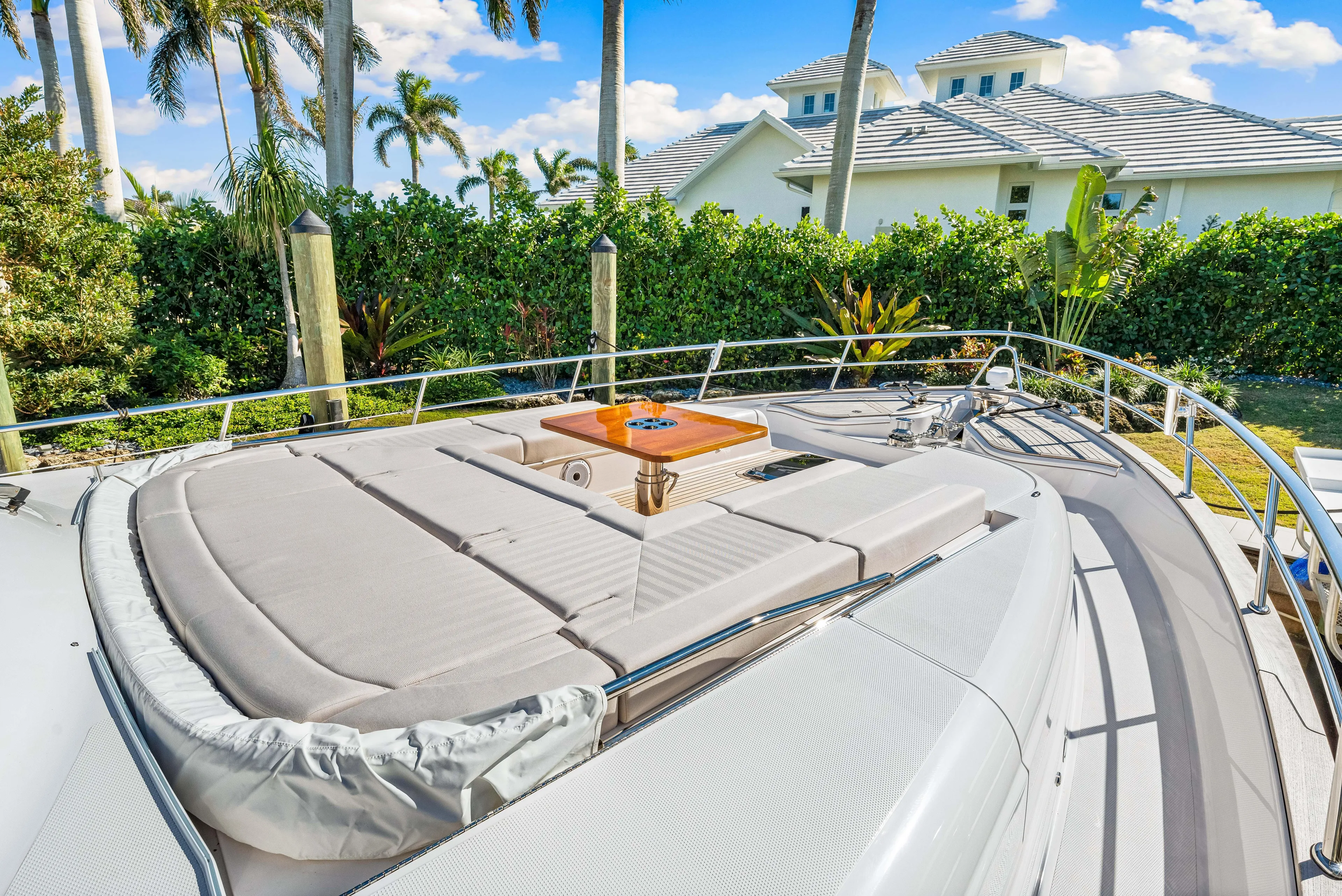 Dog House Yacht Photos Pics Luxurious 2025 Belize 66 Daybridge yacht with spacious sunbathing deck and elegant design.