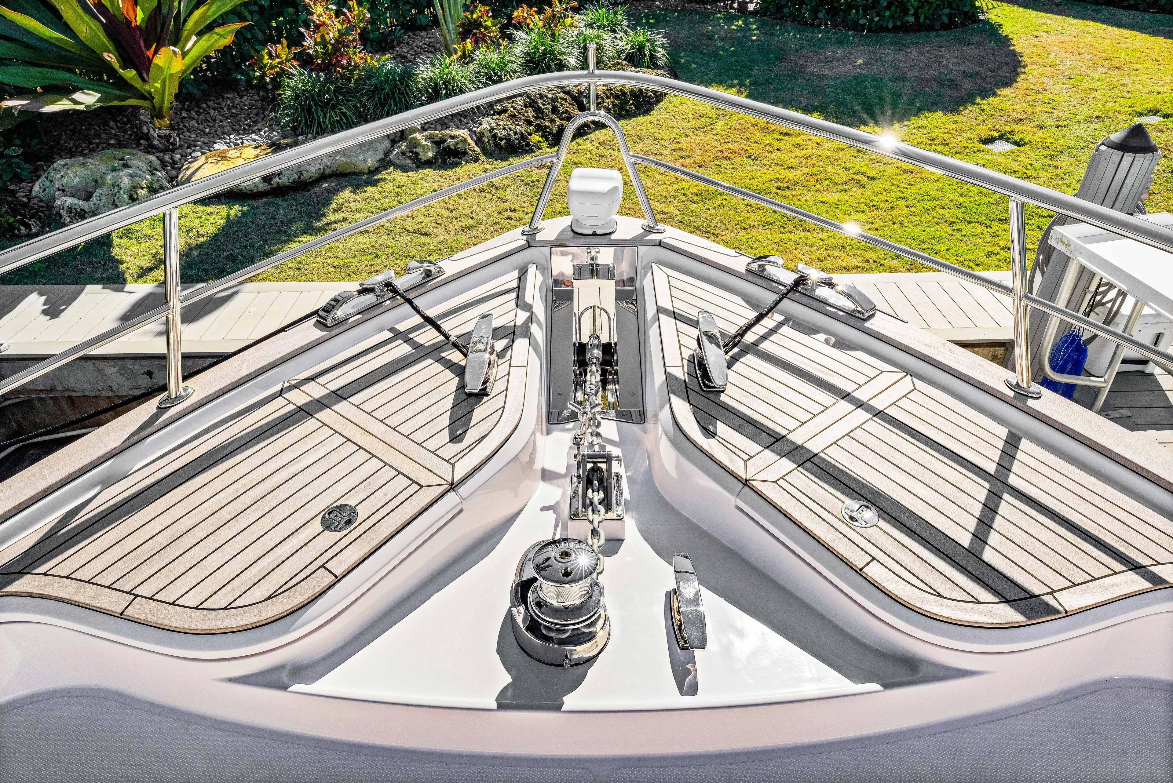 Dog House Yacht Photos Pics 2025 Belize 66 Daybridge yacht deck with sleek design and modern fittings.