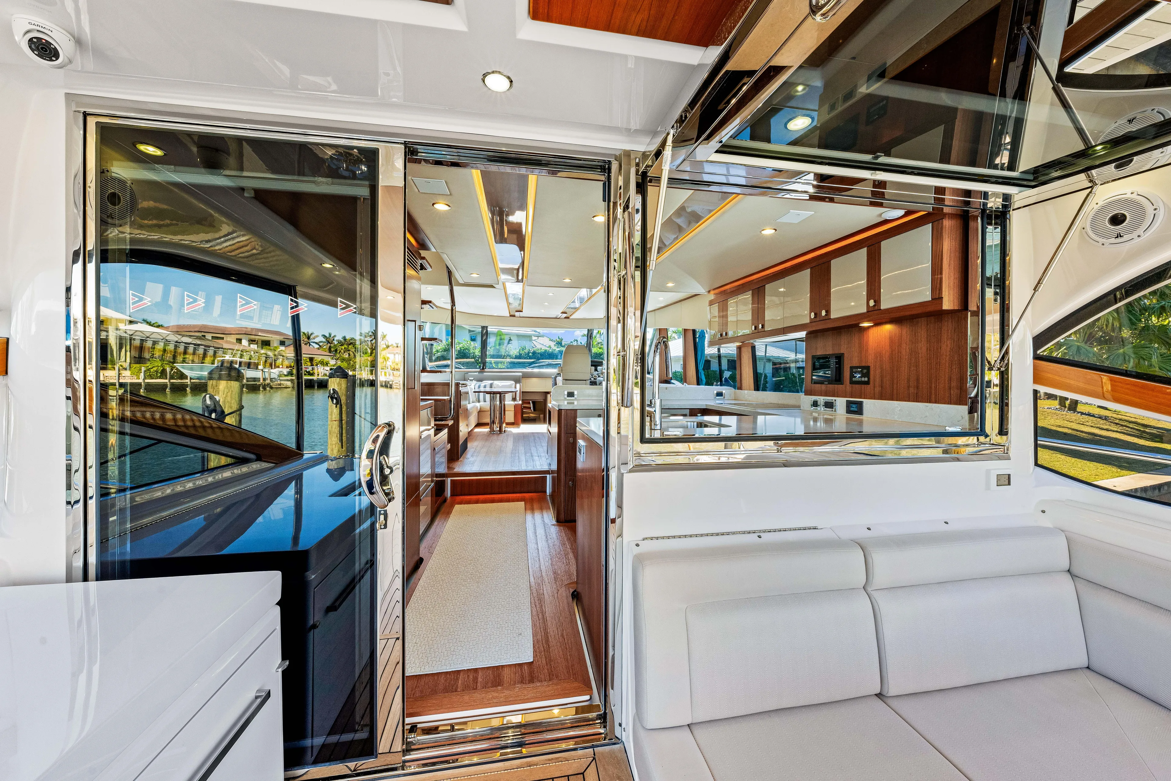 Dog House Yacht Photos Pics Luxurious interior of 2025 Belize 66 Daybridge yacht with modern design and spacious seating.