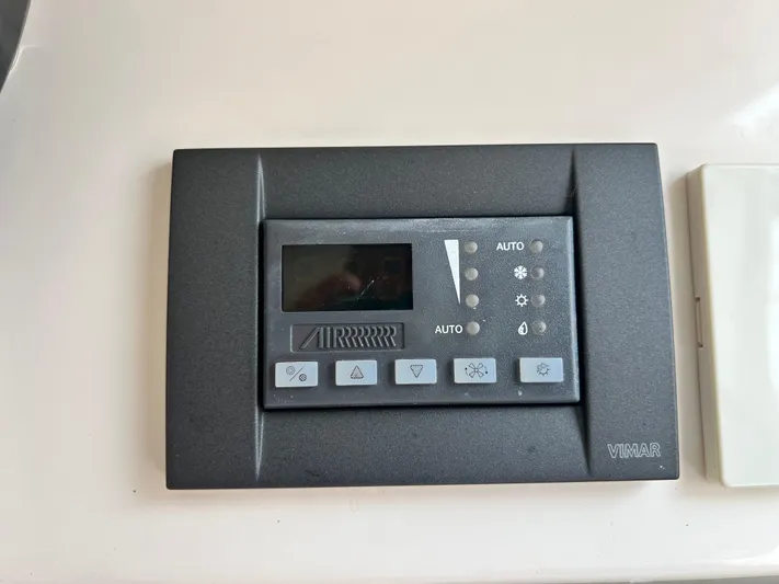  Yacht Photos Pics Control panel on a 2018 Grady-White Freedom 325 boat dashboard.