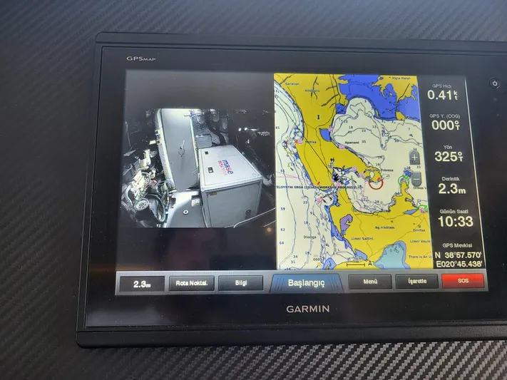  Yacht Photos Pics Garmin GPS display on Absolute NAVETTA 58 yacht, showing navigation map and engine room view.