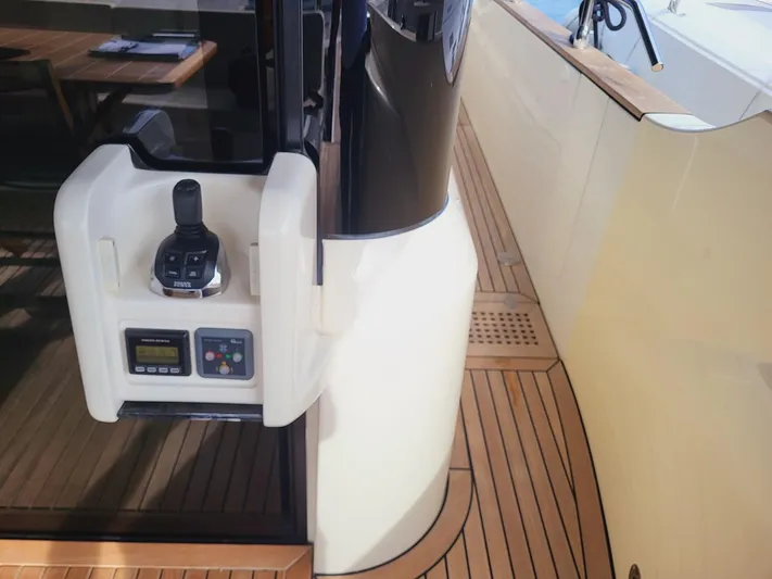  Yacht Photos Pics Control panel on 2017 Absolute NAVETTA 58 yacht with teak deck.