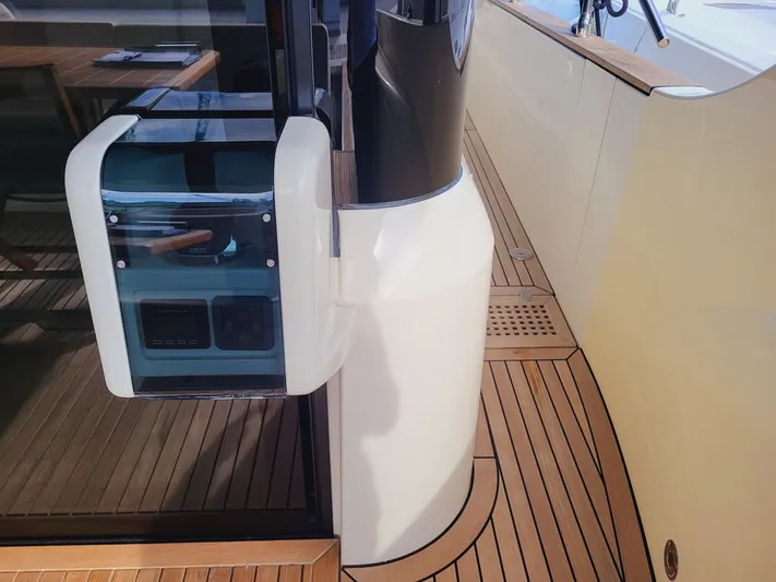  Yacht Photos Pics Deck view of 2017 Absolute NAVETTA 58 yacht with wooden flooring and modern design.