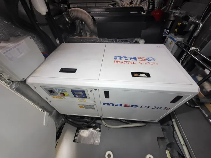  Yacht Photos Pics Engine room of 2017 Absolute NAVETTA 58 yacht with Mase generator.