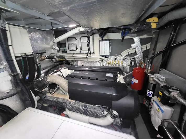  Yacht Photos Pics Engine room of 2017 Absolute NAVETTA 58 yacht, featuring complex machinery and piping.