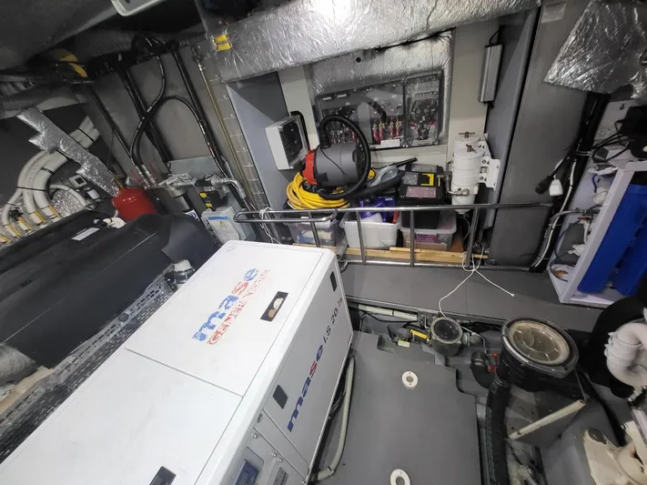  Yacht Photos Pics Engine room of 2017 Absolute NAVETTA 58 yacht, featuring equipment and wiring.