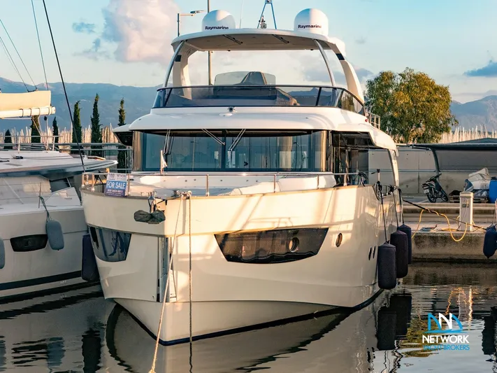  Yacht Photos Pics Luxury yacht Absolute NAVETTA 58, 2017 model, docked at marina, for sale sign visible.