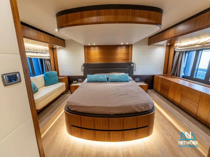  Yacht Photos Pics Luxurious bedroom interior of 2017 Absolute NAVETTA 58 yacht with modern wood finishes.