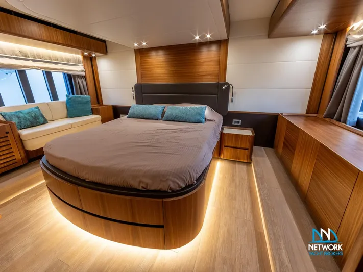  Yacht Photos Pics Luxurious bedroom interior of 2017 Absolute NAVETTA 58 yacht with modern wood finishes.