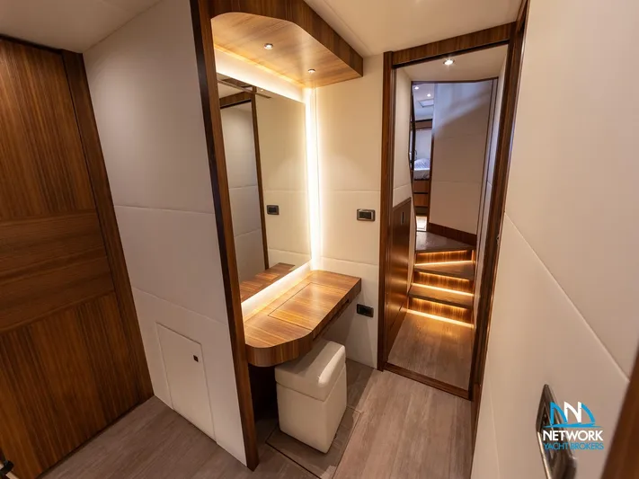  Yacht Photos Pics Luxurious interior of 2017 Absolute NAVETTA 58 yacht with elegant wood finishes and ambient lighting.