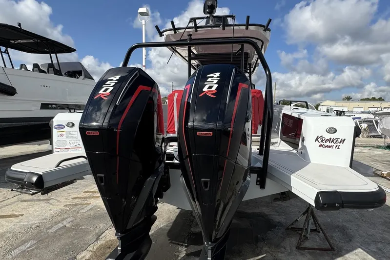 Kraken Yacht Photos Pics 2023 BRABUS Shadow 900 ST with dual 450R engines, docked under a clear sky.