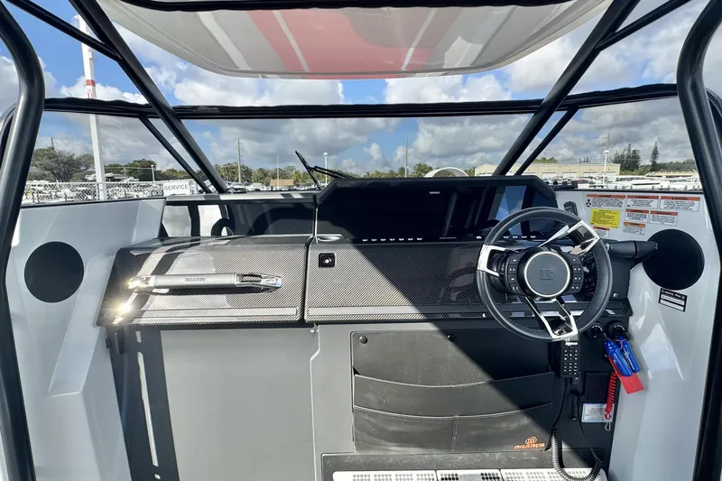 Kraken Yacht Photos Pics 2023 BRABUS Shadow 900 ST cockpit with sleek steering wheel and modern dashboard design.