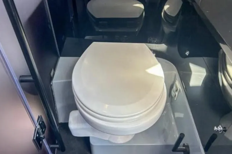 Kraken Yacht Photos Pics Luxury bathroom in 2023 BRABUS Shadow 900 ST yacht, featuring modern toilet design.