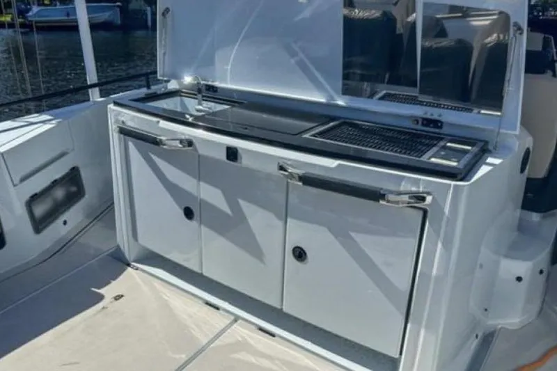 Kraken Yacht Photos Pics 2023 BRABUS Shadow 900 ST yacht kitchen area with sleek design and modern amenities.